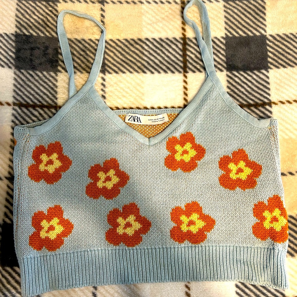Women’s knitted crop tank! Love the cute orange flowers with the blue 🥲